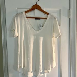 Cream colored Abercrombie tee.